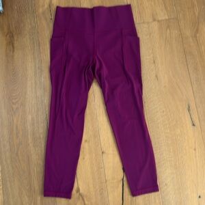 Athleta salutation stash pocket 7/8 size medium